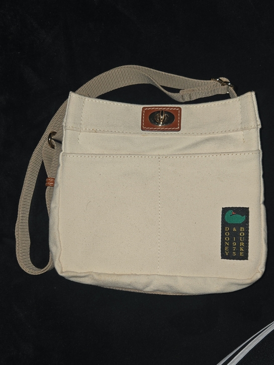 Dooney & Bourke Handbags - Dooney & Bourke Cream Canvas Crossbody with Tan Trim
